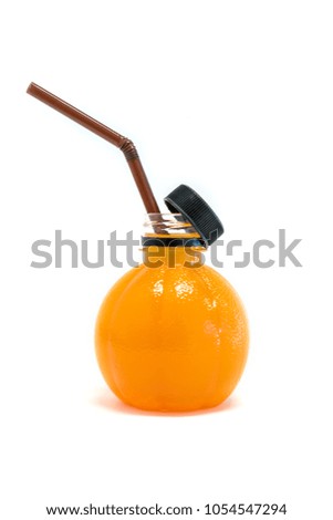 Orange juice in orange shape bottle with white background