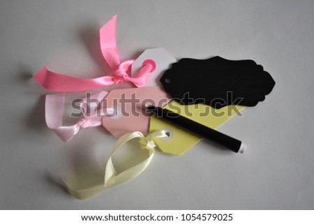Pastel coloured label tags, and black chalkboard label; place your own price of message. 