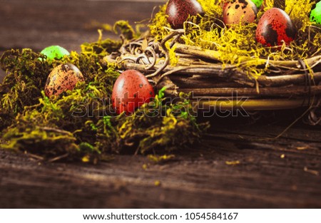 Painted Eggs on Easter table. Easter Eggs in the Basket.