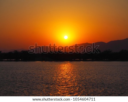 Sunset view and scenery of lake and mountain at Summer Palace in Beijing, China. For nature background.