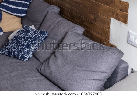 Modern sofa of a house. Grey sofa close-up