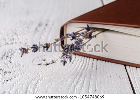 it's memories, a bouquet of dry lavender and books