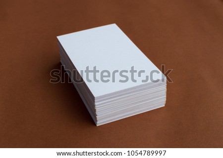 Rectangular business card is designed for job and business contact information.