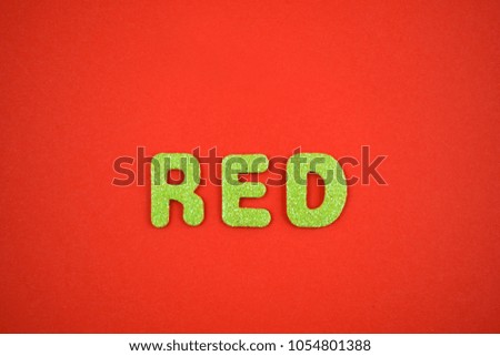 Green inscription Red stock images. Decorative green inscription. Green lettering on a red background