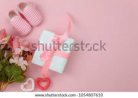 Top view aerial image of decoration Happy mother’s day holiday background concept.Flat lay mom white card with blue flower on modern beautiful  blue paper at home office desk.Free space for design.