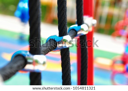 Mesh rope for climbing adventure and it can be installed in the playground. Concept is climbing creates good health and improves mental skill for children. Picture is selective focus style.