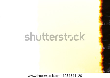 Abstract film texture with burned edge. Royalty-Free Stock Photo #1054841120