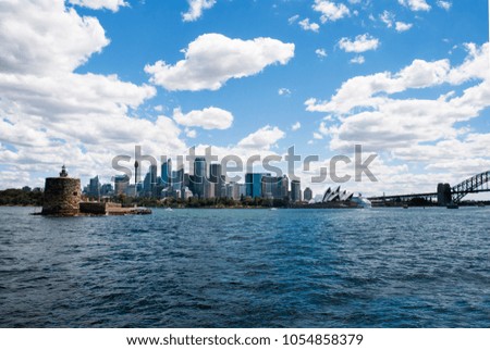 The city skyline of Sydney with lighthouse