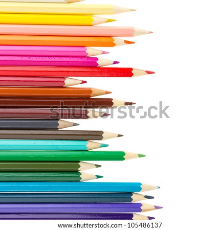 Many different color pencils isolated on white