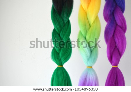 Kanekalon. Colored artificial strands of hair. Material for plaiting braids