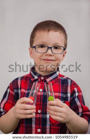 Boy with glasses as a scientist
