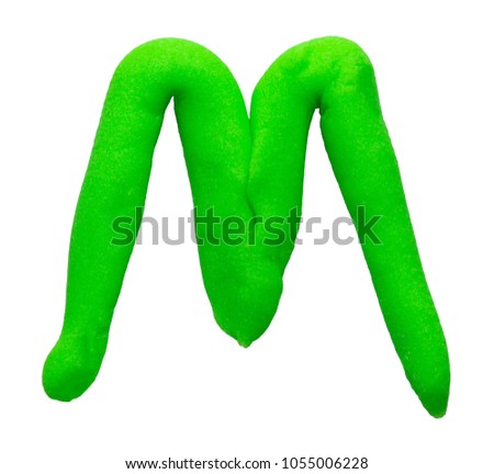 Plasticine letter M isolated on a white background.