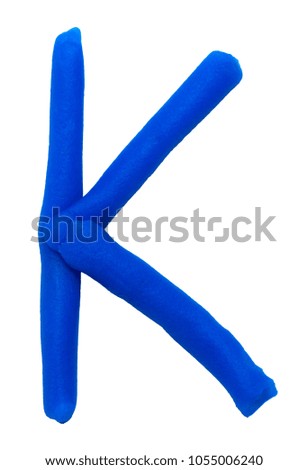 Plasticine letter K isolated on a white background.