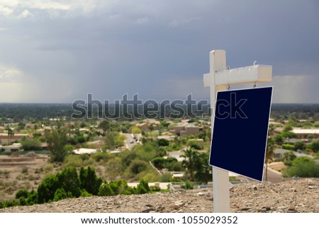 Real Estate Sign on a Mountain View Land Parcel Lot 