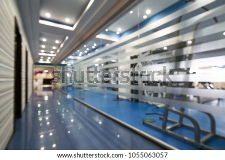 Blurred Empty Long Corridor In Modern Fitness gym
