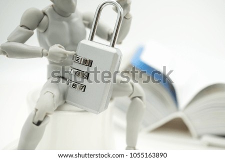 Miniature people: Hacker thinking to hack data and security key with copy space using as background security system, business online services concept.