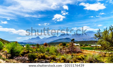 The Little Karoo region of the Western Cape Province of South Africa with the majestic Grootswartberg Mountains on the horizon Royalty-Free Stock Photo #1055176439