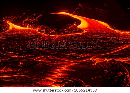 Lava advancing from Kilauea's 61g lava flow Royalty-Free Stock Photo #1055214359