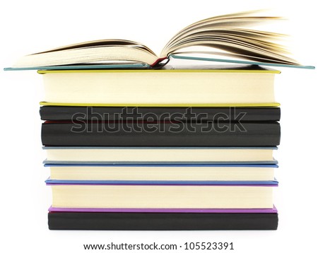 pile of color hardcover books over white background