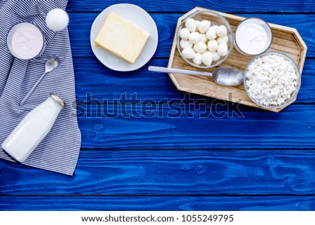 Dairy products from farm. Milk, cottage, cheese, yougurt on wooden top view mockup