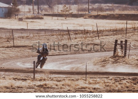 Motocrossing in the dirt