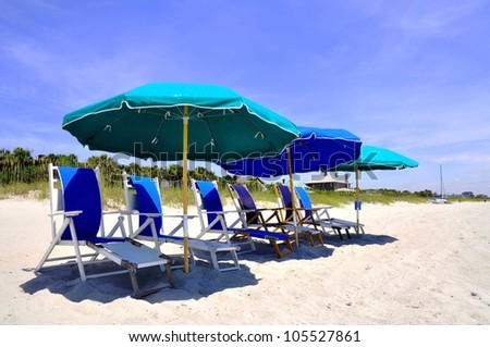 Beach Umbrellas and Beach Chairs waiting for sunbathers