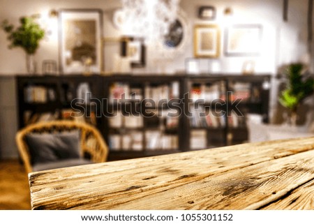 Table background and blurred home interior. Free space for your decoration. 