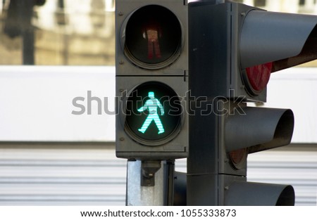 green traffic light for pedestrians Royalty-Free Stock Photo #1055333873