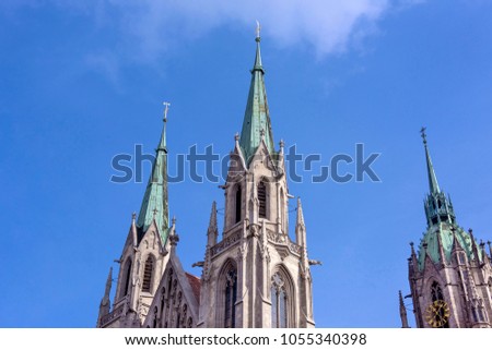 Germany, Bavaria, Munich, near Theresienwiese: Detail steeple of famous German St Paul's Church (Paulskirche) in the city cetner of the Bavarien capital with blue sky in the background.