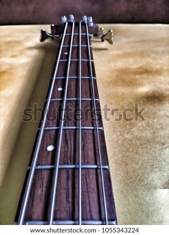 Detail of a bass guitar neck
