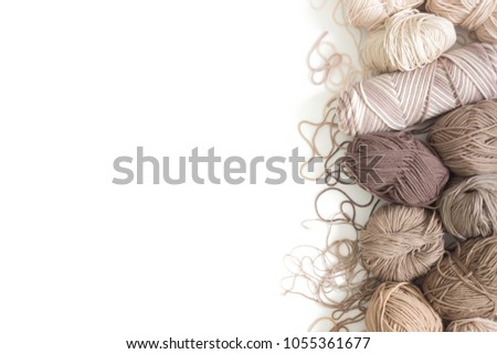 The yarn is beige, brown