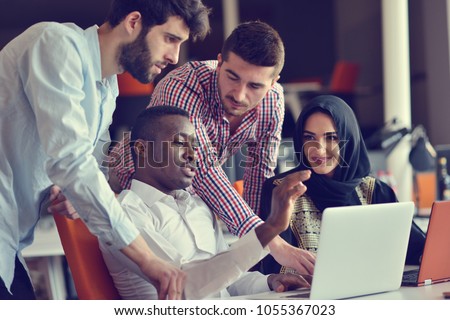 startup business people group working everyday job at modern office Royalty-Free Stock Photo #1055367023