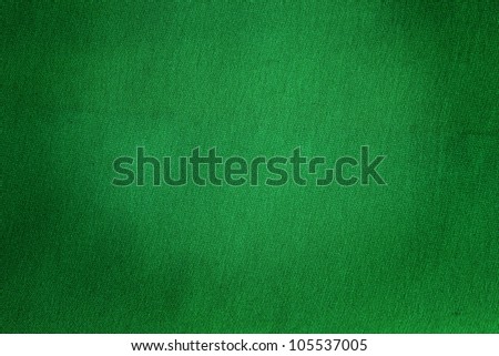Green old grunged textile for the use of a background