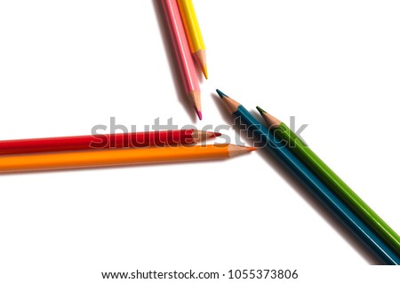 Pencils Orange, Red, Green, Blue, Pink and Yellow on a White Background.