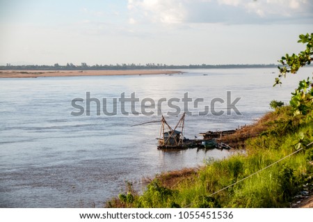 Kratie, Cambodia - nov 2015 : platform with fishing nets on the banks of the immense Mekong river at Kratie in Cambodia 