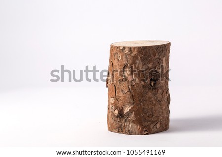 Wood log isolated on a white background Royalty-Free Stock Photo #1055491169