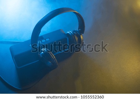 Music concept. Speaker and headphones isolated