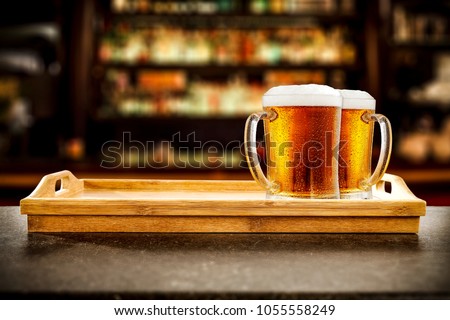 Cold beer in bar and free space for your decoration. 