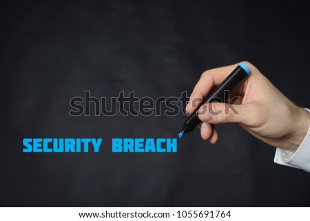 The businessman writes a blue marker inscription:SECURITY BREACH