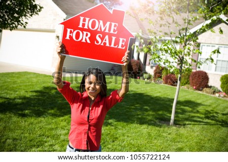 Extensive series of a Caucasian Real Estate Agent and African-American Couple in front of a home.