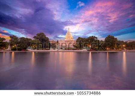 The United States Capitol building in Washington DC, sunrise Royalty-Free Stock Photo #1055734886