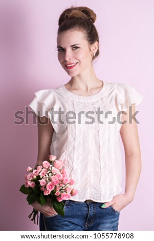 beautiful woman with a bouquet of roses