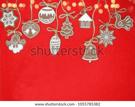 christmas cookies and gingerbread traditional food on red board 