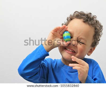 little boy with Easter egg with grey background stock image stock photo