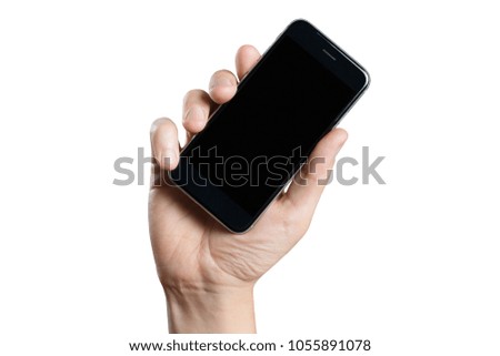 Hand holding black smartphone, isolated on white background