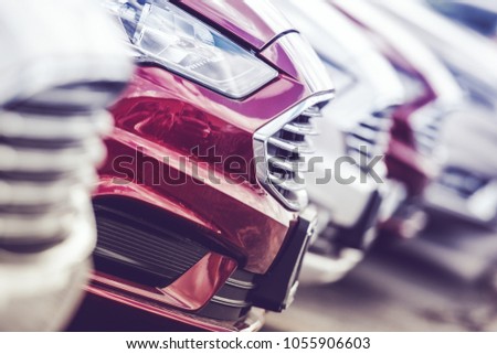 Automotive Industry Concept. New Cars Production Line. Brand New Vehicles on the Factory Lot. 