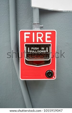 push in pull down switch fire on grey wall