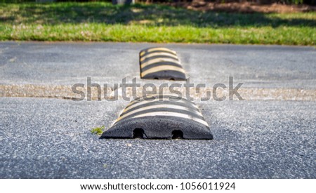 Striped speed bumps