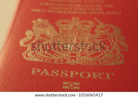 Britain passport cover toned blurred closeup background photo