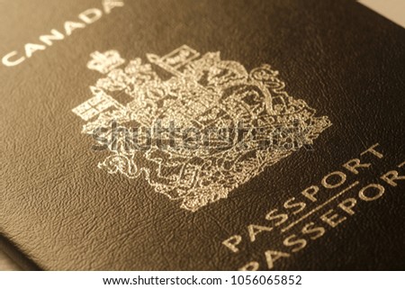 Canadian passport cover toned blurred closeup background photo